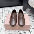 Miu Miu Logo-Embossed Ballet Flats