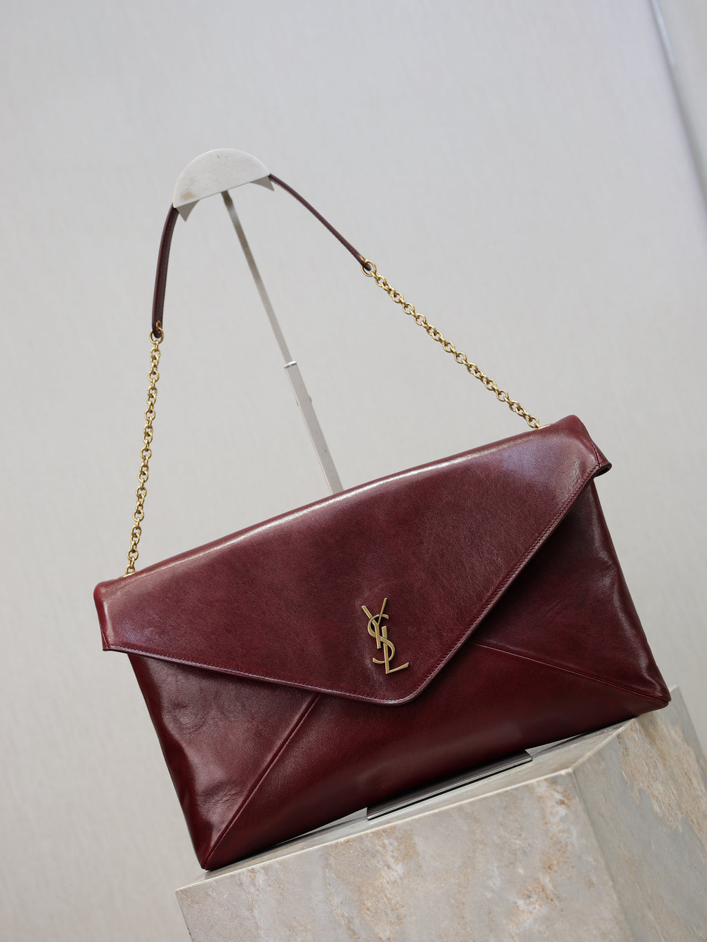 Saint Laurent Cassandre Large Pouch On Chain In Lambskin