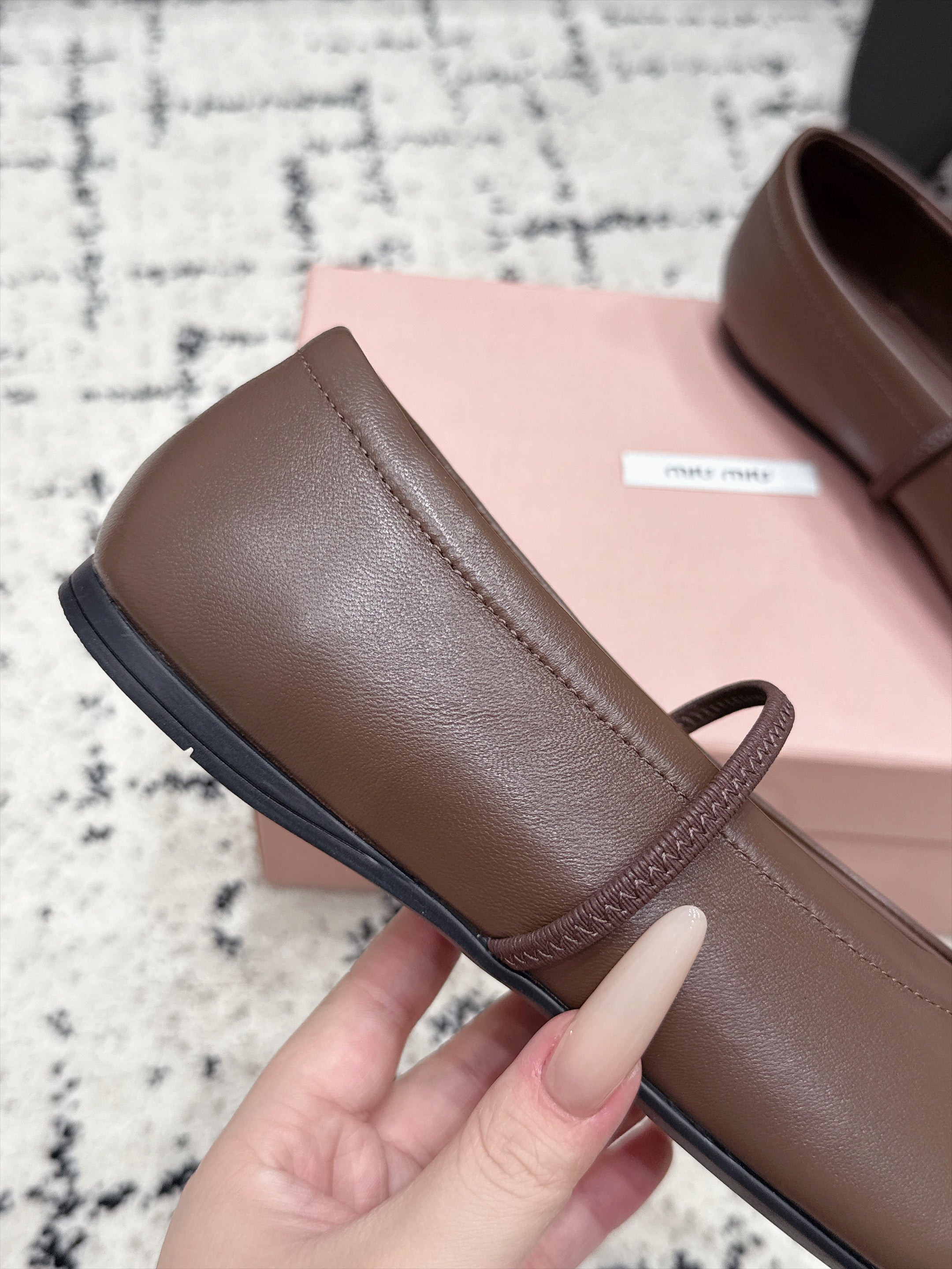 Miu Miu Logo-Embossed Ballet Flats
