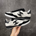 Chanel Trainer Sneakers in Calfskin and Goatskin
