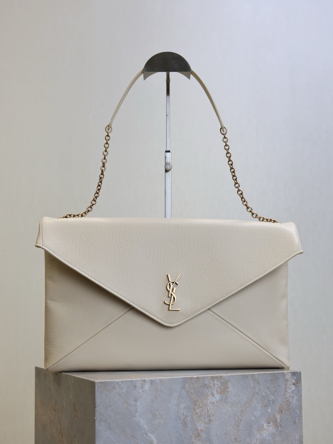 Saint Laurent Cassandre Large Pouch On Chain In Lambskin