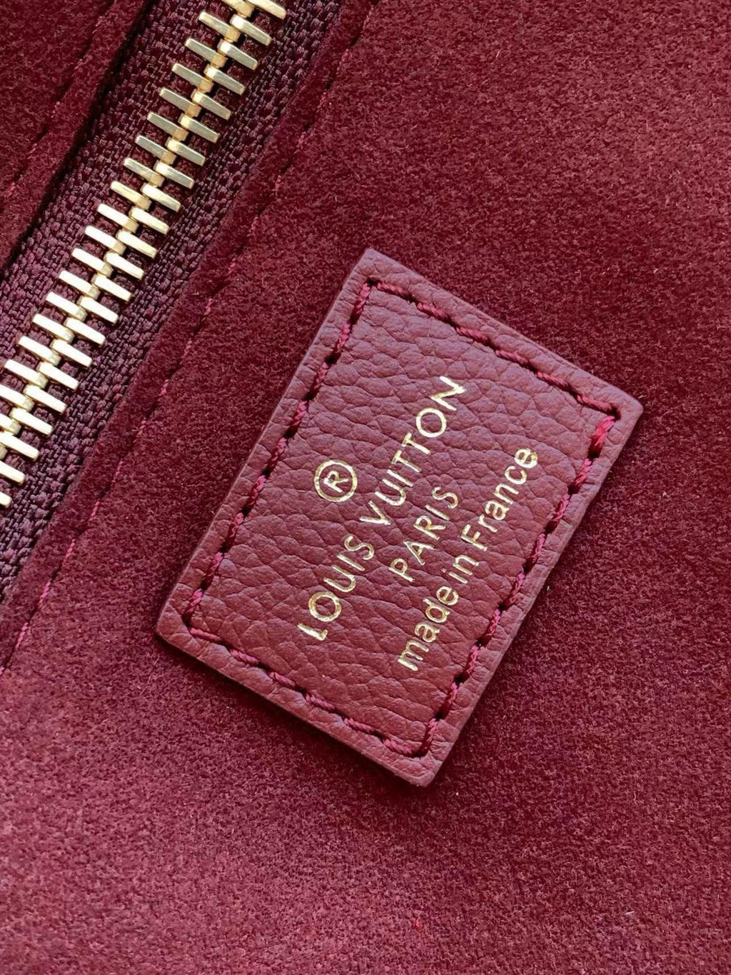 LV Neverfull MM In Embossed Monogram Empreinte Leather M25855