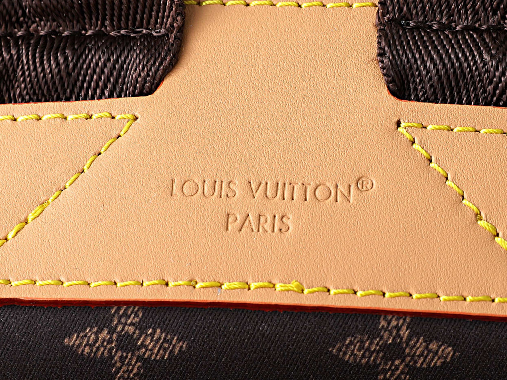LV Christopher East West MM Silk Tech M29853
