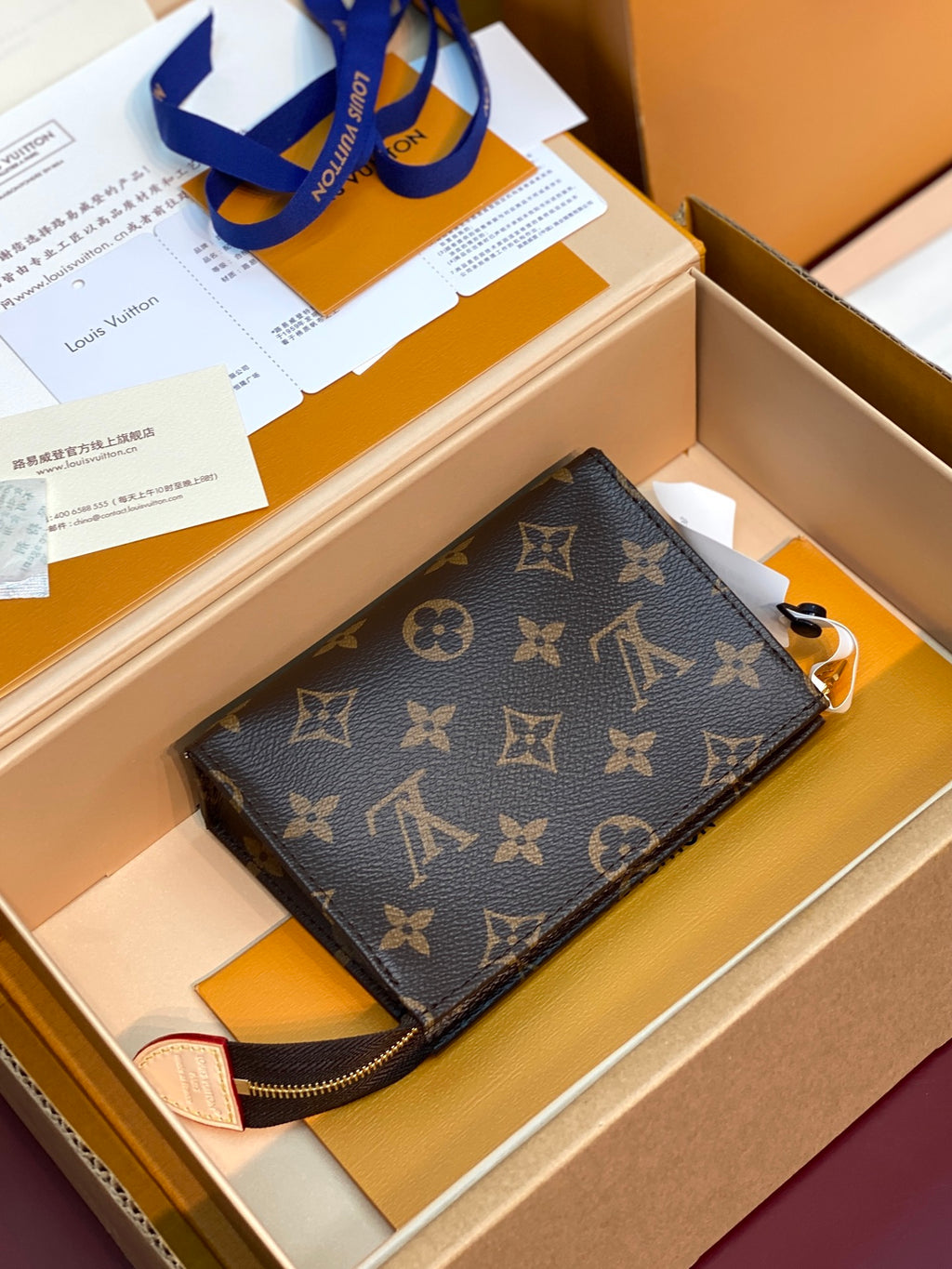 LV Poche Toilette M29700