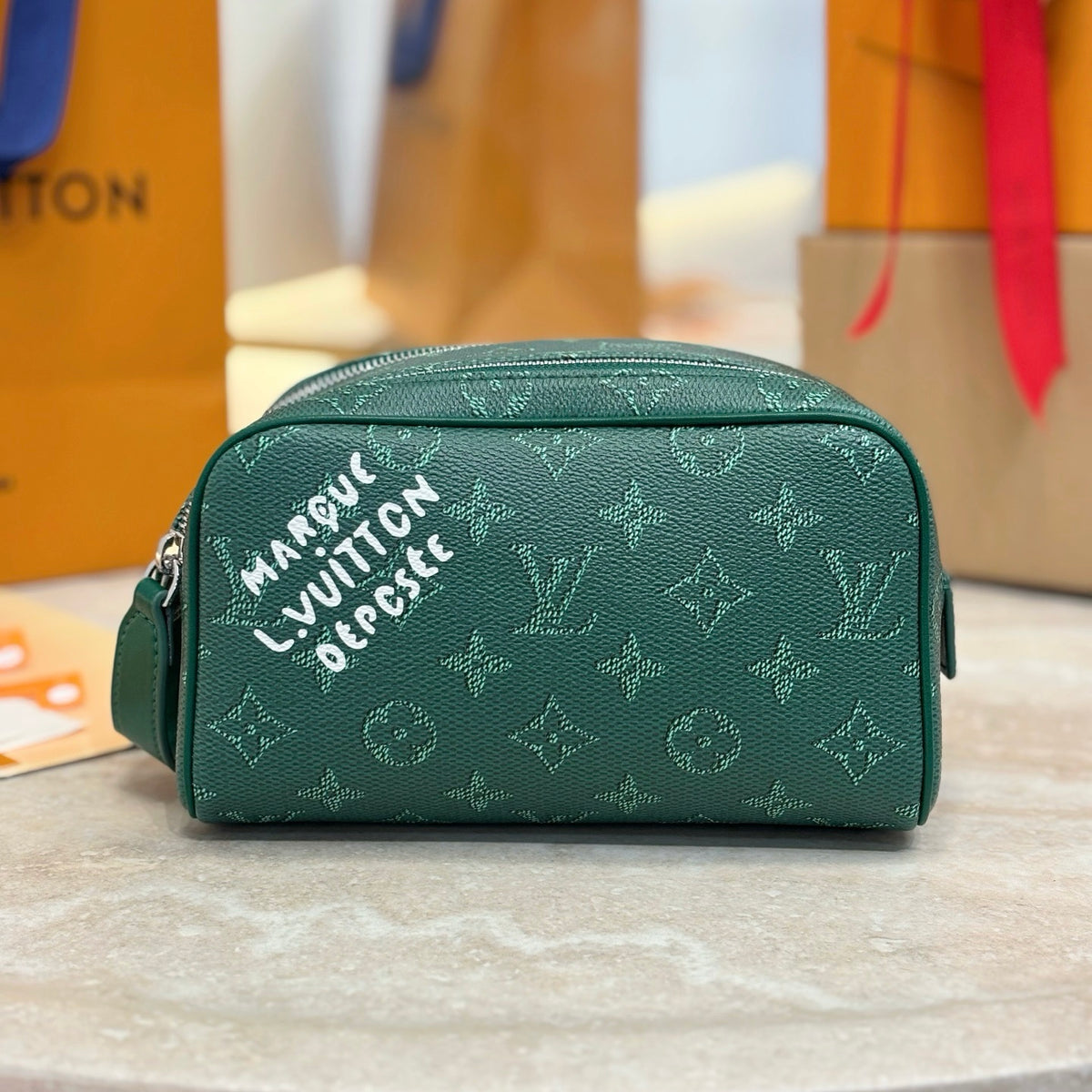 LV Mini Dopp Kit Monogram Heritage Coated Canvas