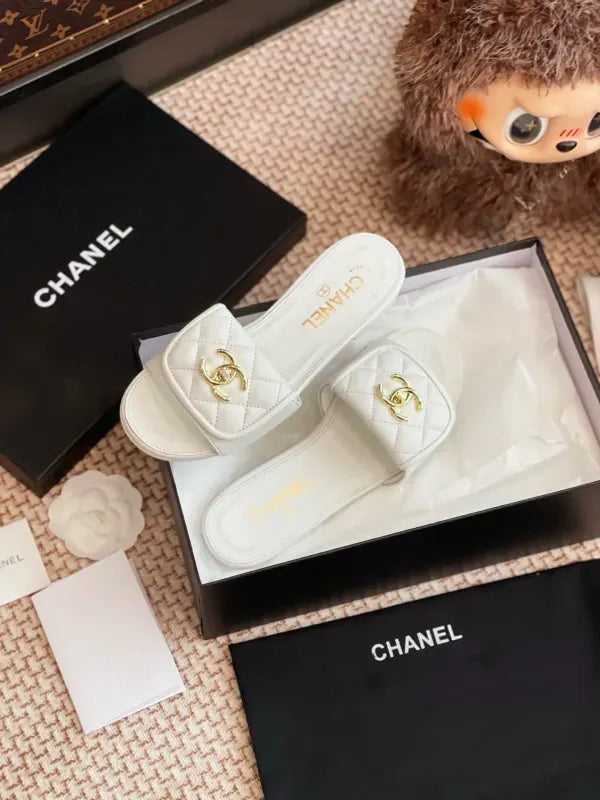 Chanel Quilted CC Turnlock Flat Mules in Lambskin