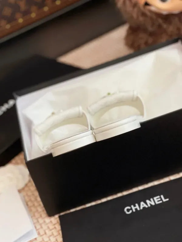 Chanel Quilted CC Turnlock Flat Mules in Lambskin